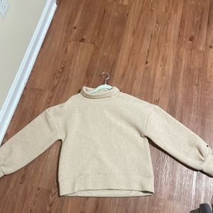 Small beige-colored long sleeve, CALIA by Carrie Underwood